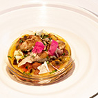 色々なハーブ香るリボリータ　岩牡蠣のラルド包み焼き